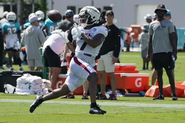 Atlanta Falcons running back Bijan Robinson (7) does drills during a joint practice with the Miami Dolphins at the NFL football team's training facility, Tuesday, Aug. 8, 2023, in Miami Gardens, Fla. (AP Photo/Lynne Sladky)