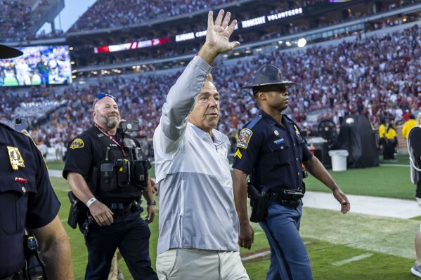 Alabama head coach Nick Saban walks to the Alabama student section to salute the fans postgame, a rare occurrence, after an NCAA college football game against Tennessee, Saturday, Oct. 21, 2023, in Tuscaloosa, Ala. Saban had asked for fans to be loud and help build momentum during his call-in show earlier in the week. (AP Photo/Vasha Hunt)