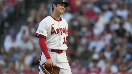 Los Angeles Angels starting pitcher Shohei Ohtani (17) reacts as he leaves the field in the middle of the fourth inning of a baseball game against the Pittsburgh Pirates in Anaheim, Calif., Friday, July 21, 2023. (AP Photo/Ashley Landis)