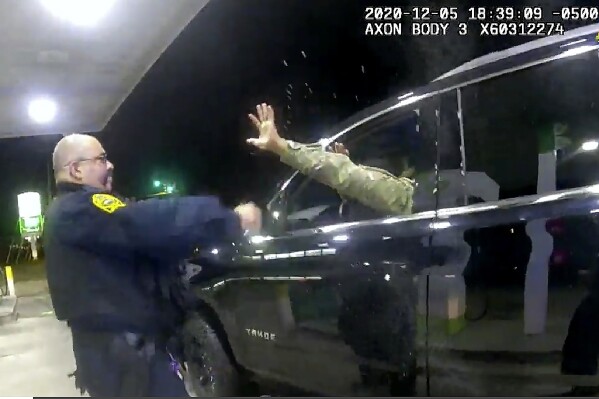 FILE - In this image made from Windsor, Va., Police Department video footage, a police officer uses a spray agent on Caron Nazario, Dec. 20, 2020, in Windsor, Va. On Thursday, Sept. 7, 2023, the town of Windsor agreed to independent reviews of allegations of misconduct against its police force and to give its officers more training to settle a lawsuit filed after the Black and Latino Army lieutenant was pepper sprayed during a traffic stop. (Windsor Police Department via AP, File)
