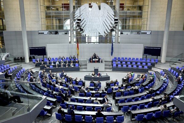 Members of the Bundestag debate during the 157th session of the Bundestag, in Berlin Thursday, March 14, 2024. Topics include the vote on the delivery of the Taurus cruise missile to Ukraine and a debate on the Citizens' Council's recommendations on food policy, the election of a federal police commissioner and the reform of the Federal Police Act. (Britta Pedersen/dpa via AP)