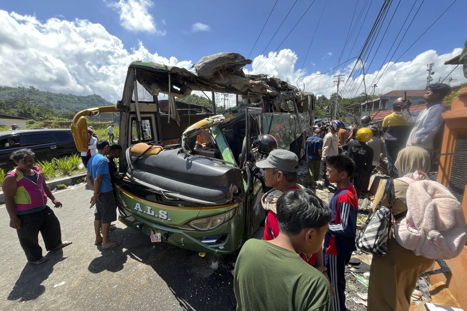 At least 12 dead in Indonesia bus crash after brakes apparently failed, police say