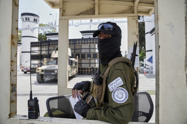 Taliban fighters are standing guard in front of the former US embassy in Kabul, Afghanistan on Thursday, June 5, 2025 (AP Photo/Ebrahim Noroozi)