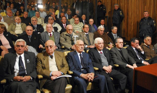 FILE - This July 2 2010 file photo, shows Ruiz Mones, from left to right, Vicente Meli, former Argentine dictator Jorge Rafael Videla, former army Gen. Luciano Benjamin Menendez, Gustavo Alsina, Pi...