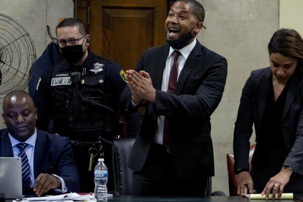 Actor Jussie Smollett speaks to Judge James Linn after his sentence is read at the Leighton Criminal Court Building, Thursday, March 10, 2022, in Chicago. Smollett maintained his innocence during his sentencing hearing Thursday after a judge sentenced the former “Empire” actor to 150 days in jail for lying to police about a racist and homophobic attack that he orchestrated himself. (Brian Cassella/Chicago Tribune via AP, Pool)