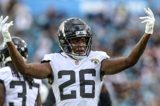 FILE -Jacksonville Jaguars cornerback Shaquill Griffin (26) encourages funs during the second half of an NFL football game against the Indianapolis Colts, Sunday, Sept. 18, 2022, in Jacksonville, Fla. The Minnesota Vikings agreed to terms on a contract Tuesday, March 19, 2024 with free agent cornerback Shaquill Griffin, adding some needed experience to an unproven position group.(AP Photo/Gary McCullough, File)