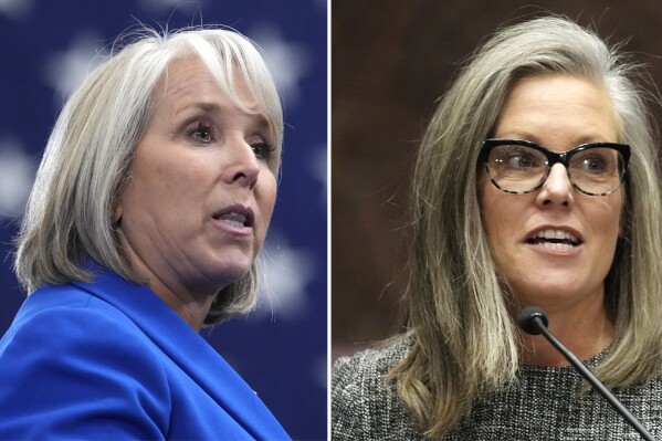 FILE - This combo images shows New Mexico Gov. Michelle Lujan Grisham, left, and Arizona Gov. Katie Hobbs, right. Trade missions took Lujan Grisham and counterpart Hobbs to the self-governing island of Taiwan that China would like to see reunited with the mainland. (AP Photo, File)