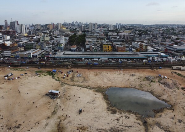 A section of the Negro River is dry at the port in Manaus, Amazonas state, Brazil, Oct. 4, 2024, amid a severe drought. (AP Photo/Edmar Barros, File)