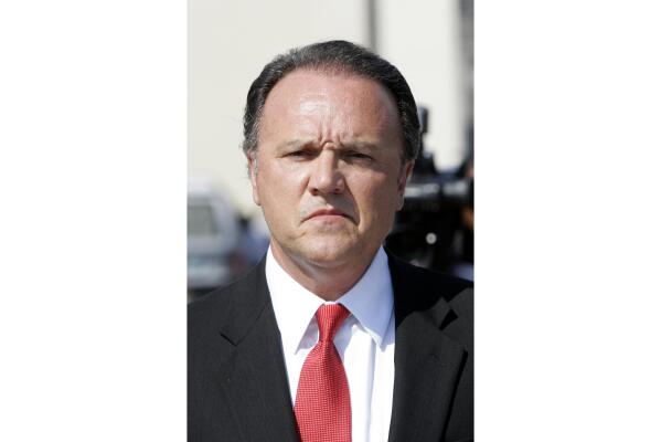 FILE - Former HealthSouth CEO Richard Scrushy leaves the federal building after he was convicted on six counts in a government corruption case in Montgomery, Ala. June 29, 2006. Scrushy, who once led HealthSouth, a huge provider of outpatient rehab services, has been ordered to turn over records related to a bank account that lawyers say he's using to hide millions. (AP Photo/Rob Carr/File)