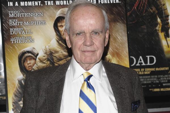 FILE - Author Cormac McCarthy attends the premiere of "The Road" in New York on Nov. 16, 2009. The Twitter account for the famous, and famously media-shy author is fake. The McCarthy account, @CormacMcCrthy, had more than 48,000 followers as of midday Monday, among them Stephen King. It was established in September 2018, but was only recently given a blue check for verification. (AP Photo/Evan Agostini, File)