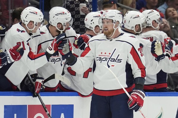 Washington Capitals right wing Anthony Mantha (39) celebrates with the bench after his goal against the Tampa Bay Lightning during the second period of an NHL hockey game Thursday, Feb. 22, 2024, in Tampa, Fla. (AP Photo/Chris O'Meara)