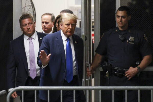 Former President Donald Trump returns to the courtroom after a recess at Manhattan criminal court, Monday, April 22, 2024, in New York. (AP Photo/Yuki Iwamura, Pool)
