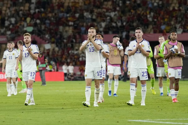 Champion Spain squeezes Greece out in penalty shootout