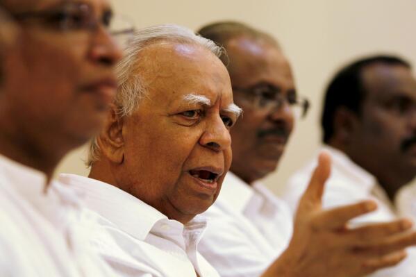 Tamil National Alliance leader Rajavarothayam Sampanthan speaks during a media briefing in Colombo, Sri Lanka, Tuesday, Dec. 30, 2014. Sri Lanka's main ethnic Tamil political party said that it will support opposition candidate Maithripala Sirisena in January's presidential election, in the latest blow to Mahinda Rajapaksa's bid for a third term in office. (AP Photo/Eranga Jayawardena)