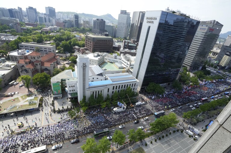  of the Korean Federation of Trade Unions gather for a Labor Day rally in Seoul, South Korea, Wednesday, May 1, 2024. Workers, activists and others in Asian capitals took to the streets Wednesday to mark Labor Day with protests against rising prices, government labor policies and calls for more workers' rights.  (AP Photo/Ahn Young Joon)