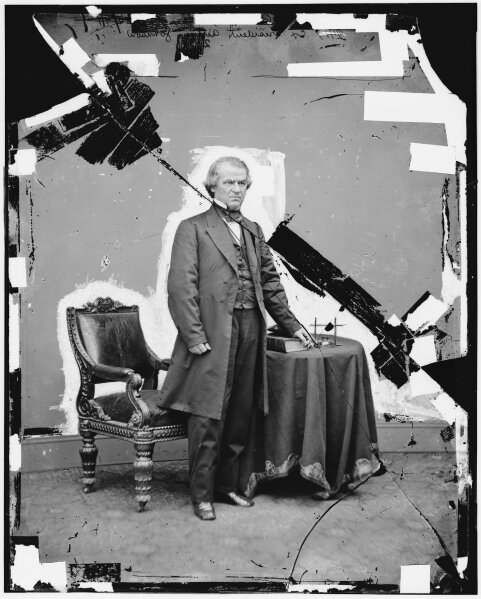 This 1865-1880 photo made available by the Library of Congress shows a damaged glass negative of President Andrew Johnson. Johnson, a Democrat, became vice president under Republican Abraham Lincoln on a unity ticket elected amid the Civil War in 1864. He became president after Lincoln’s assassination in April 1865. (Brady-Handy photograph collection/Library of Congress via AP)