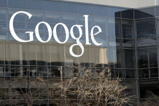 FILE - This Thursday, Jan. 3, 2013, file photo shows Google's headquarters in Mountain View, Calif.  The U.S. Justice Department is readying an investigation of Google’s business practices and whet...