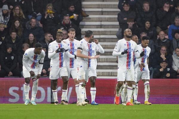 Crystal Palace's Jordan Ayew, third right, celebrates scoring during the English Premier League soccer match between Bournemouth and Crystal Palace at the Vitality Stadium, Bournemouth, England, Saturday Dec. 31, 2022. (Zac Goodwin/PA via AP)