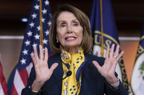 
              Speaker of the House Nancy Pelosi, D-Calif., talks to reporters a day after officially postponing President Donald Trump's State of the Union address until the government is fully reopened, at the Capitol in Washington, Thursday, Jan. 24, 2019.  (AP Photo/J. Scott Applewhite)
            