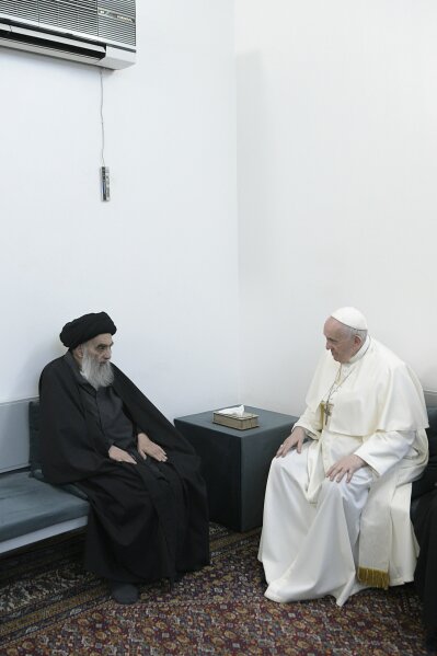 Pope Francis meets with Iraq's leading Shiite cleric, Grand Ayatollah Ali al-Sistani in Najaf, Iraq, Saturday, March 6, 2021. The closed-door meeting was expected to touch on issues plaguing Iraq's Christian minority. Al-Sistani is a deeply revered figure in Shiite-majority Iraq and and his opinions on religious matters are sought by Shiites worldwide. (AP Photo/Vatican Media)