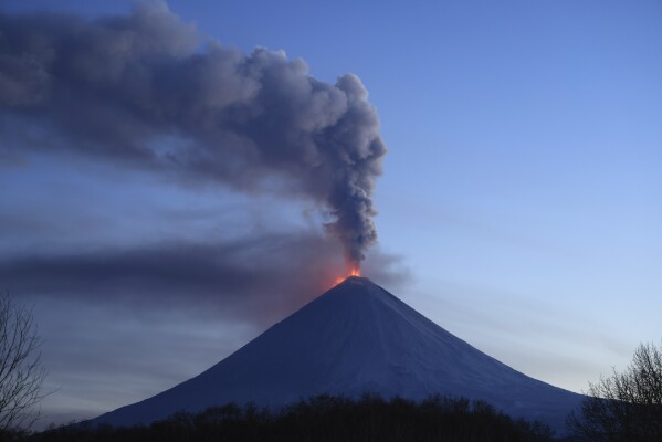 The Klyuchevskoy volcano, one of the highest active volcanoes in the world, erupts in Russia's northern Kamchatka Peninsula, Russian Far Eat, on Sunday, Oct. 29, 2023. Huge ash columns erupted from Eurasia's tallest active volcano on Wednesday, Nov. 1, 2023, forcing authorities to close schools in two towns in the region. (AP Photo/Yuri Demyanchuk)