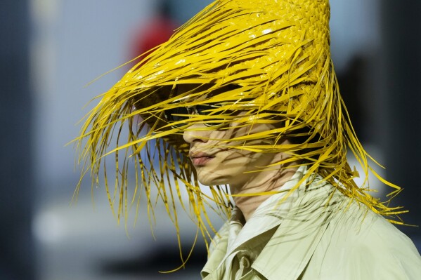 A model wears a creation as part of the men's Prada Spring-Summer 2026 collection, that was presented in Milan, Italy, Sunday, June 22, 2025. (AP Photo/Luca Bruno)