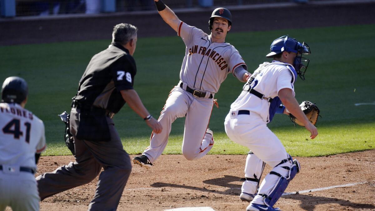 Solano, Longoria HR, Webb sharp as Giants beat Dodgers 11-6