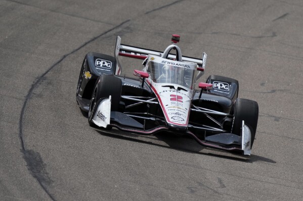 Josef Newgarden drives his car during an IndyCar Series auto race, Saturday, July 22, 2023, at Iowa Speedway in Newton, Iowa. (AP Photo/Charlie Neibergall)
