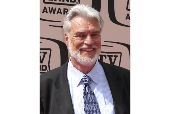 In this photo provided by Kathy Hutchins, Richard Moll arrives at the 2010 TV Land Awards Sony Studios Culver City, Calif., April 17, 2010. Moll, a character actor who found lasting fame as an eccentric but gentle giant bailiff on the original "Night Court" sitcom, has died at age 80. Moll died Thursday, Oct. 26, 2023, at his home in Big Bear Lake, Calif., according to a Jeff Sanderson, a family spokesperson. (Kathy Hutchins/Hutchins Photo via AP)