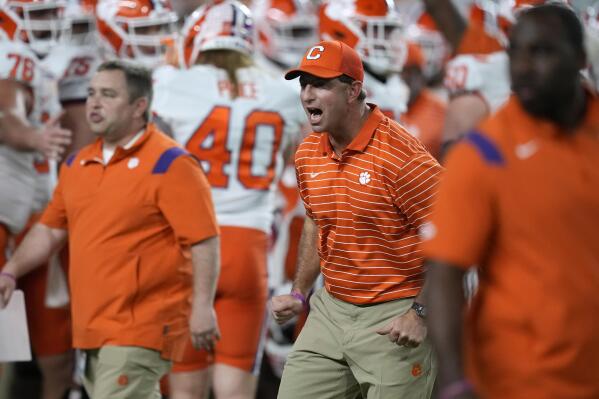 Clemson coach Dabo Swinney encourages players before the team's Orange Bowl NCAA college football game against Tennessee, Friday, Dec. 30, 2022, in Miami Gardens, Fla. (AP Photo/Rebecca Blackwell)