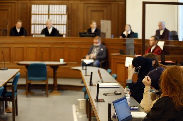 FILE - A general view shows the courtroom at the beginning of the trial of defendant Vadim K. in Berlin, Germany, Wednesday, Oct. 7, 2020. Associates of Russian opposition leader Alexei Navalny said Monday, Feb. 26, 2024 that talks were underway shortly before his death to exchange him for a Russian imprisoned in Germany. That Russian prisoner was Krasikov. (Odd Andersen/Pool Photo via AP, File)