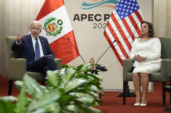 President Joe Biden, left, speaks with President of Peru Dina Boluarte during a bilateral meeting in Lima, Peru, Friday, Nov. 15, 2024. (AP Photo/Manuel Balce Ceneta)