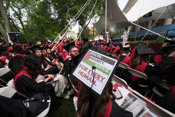 Graduating students attend commencement ceremonies at Harvard University, Thursday, May 29, 2025 in Cambridge, Mass. (AP Photo/Charles Krupa)