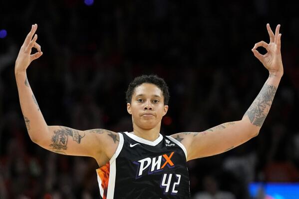Phoenix Mercury center Brittney Griner (42) celebrates her three-pointer against the Chicago Sky during the second half of a WNBA basketball game, Sunday, May 21, 2023, in Phoenix. (AP Photo/Ross D. Franklin)