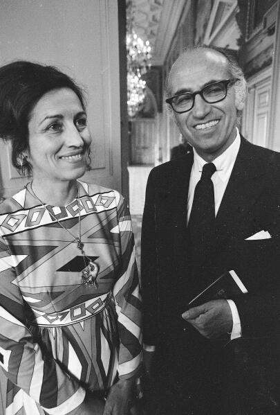 FILE - Dr. Jonas Salk, right, developer of the polio vaccine, and artist Francoise Gilot appear following their civil wedding at Paris Neuilly Town Hall on June 30, 1970. Gilot, a prolific and acclaimed painter who produced art for well more than a half-century but was nonetheless more famous for her turbulent relationship with Pablo Picasso — and for leaving him — died Tuesday in New York, where she had lived for decades. She was 101. (AP Photo/Laurent Rebours, File)