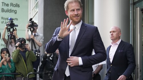 FILE - Prince Harry leaves the High Court after giving evidence in London, Wednesday, June 7, 2023. Prince Harry is seeking 320,000 pounds ($406,000) in his phone hacking lawsuit against Mirror Group Newspapers. The Duke of Sussex's lawyer submitted the claim in a court document Friday, June 30, 2023, at the conclusion of the trial that began in early May. (AP Photo/Kin Cheung, File)