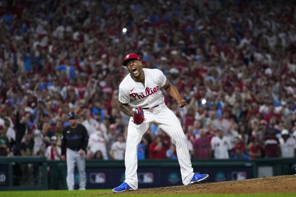 Philadelphia Phillies pitcher Gregory Soto celebrates the team's win over the Miami Marlins in Game 2 of an NL wild-card baseball playoff series Wednesday, Oct. 4, 2023, in Philadelphia. The Phillies swept the series, and move on to face the Atlanta Braves. (AP Photo/Matt Slocum)
