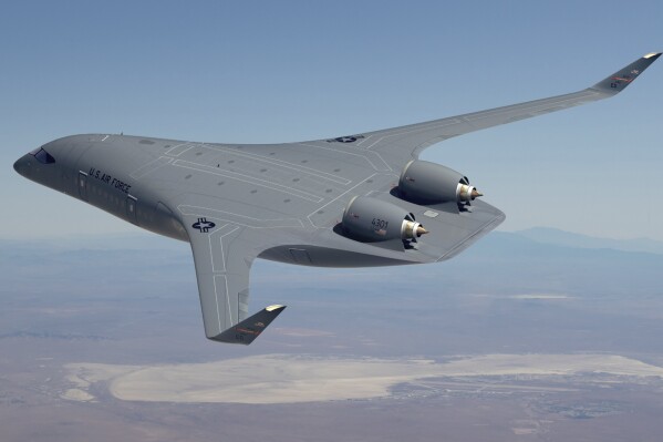 This image provided by the U.S. Air Force shows a rendering of a blended-wing body prototype aircraft. The Air Force has promised $235 million to help start-up manufacturer JetZero build a jet with a blended-wing body that officials say could provide greater range and efficiency for military tankers and cargo planes and perhaps eventually be used to carry airline passengers. JetZero and the Air Force, which announced the award Wednesday, Aug. 16, 2023, say they hope that the full-size demonstrator plane will be ready to fly in 2027. (U.S. Air Force via AP)