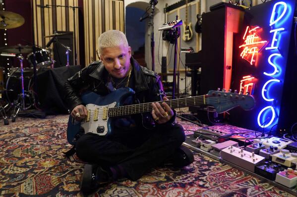 Music producer Andrew Watt poses for a portrait in his home recording studio, Wednesday, Oct. 13, 2021, in Beverly Hills, Calif. Watt, who has become one of pop music’s most sought-after hitmakers, has worked with Justin Bieber, Elton John, Dua Lipa, Miley Cyrus, Camila Cabello, and Post Malone. (AP Photo/Chris Pizzello)