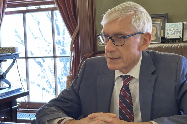 Wisconsin Democratic Gov. Tony Evers, who has pushed for full legalization of recreational marijuana, says he supports a more limited medical marijuana legalization being promoted by Republicans in an Associated Press interview on Wednesday, Jan. 3, 2024, in his Capitol office in Madison, Wisconsin. (AP Photo/Todd Richmond)