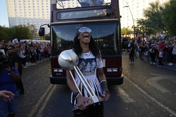 Las Vegas Aces forward A'ja Wilson celebrates during a rally to celebrate the team's WNBA championship Monday, Oct. 23, 2023, in Las Vegas. (AP Photo/John Locher)