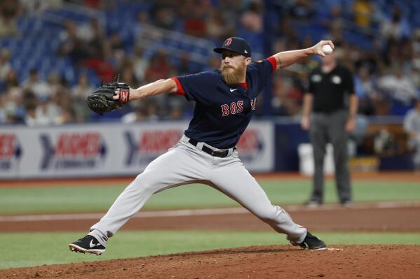 Boston Red Sox relief pitcher Jake Diekman throws to a Tampa Bay Rays batter during the seventh inning of a baseball game Wednesday, July 13, 2022, in St. Petersburg, Fla. (AP Photo/Scott Audette)