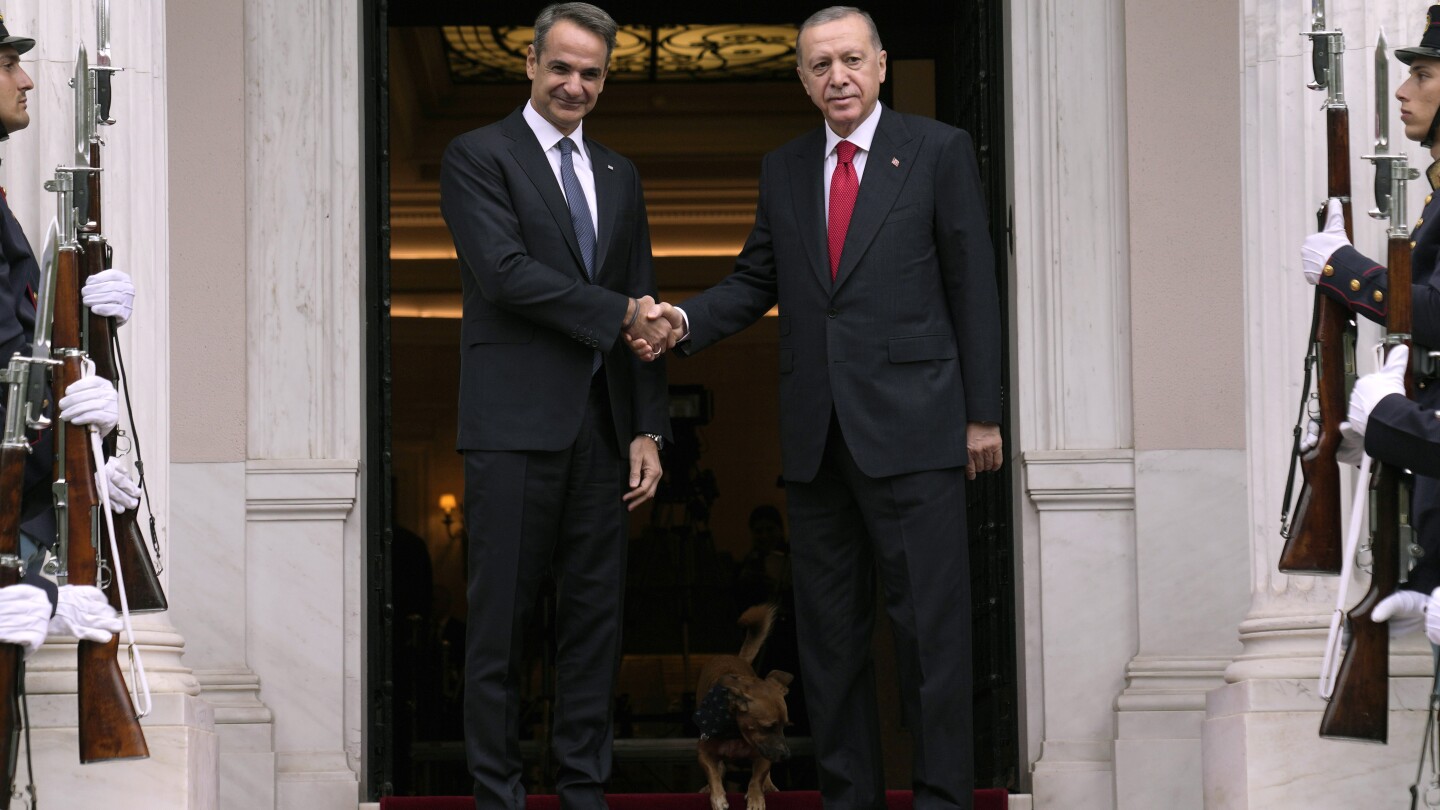 Greek and Turkish leaders seek to stress thawing relations but tensions remain under the surface