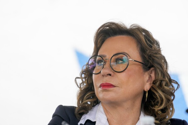 Sandra Torres, presidential candidate of UNE party, attends a meeting with Guatemalan Army veterans in Guatemala City, Tuesday, Aug. 15, 2023. Torres will face Bernardo Arévalo of the Seed Movement party in an Aug. 20 runoff election. (AP Photo/Moises Castillo)