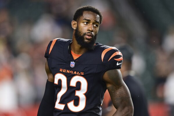 Cincinnati Bengals cornerback Dax Hill (23) warms up before an NFL football game against the Washington Commanders on Monday, Sept. 23, 2024, in Cincinnati. (AP Photo/Emilee Chinn, File)