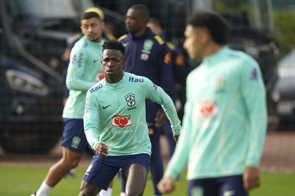 Brazil's Vinicius Junior attends a training session at the Sobha Realty Training Centre, London, Wednesday March 20, 2024, ahead of their soccer match against England on Saturday. (Adam Davy/PA via AP)