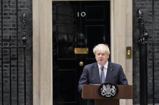 British Prime Minister Boris Johnson speaks to media next to 10 Downing Street in London, Thursday, July 7, 2022. Prime Minister Boris Johnson has agreed to resign, his office said Thursday, ending an unprecedented political crisis over his future that has paralyzed Britain's government. An official in Johnson's Downing Street office confirmed the prime minister would announce his resignation later. The official spoke on condition of anonymity because the announcement had not yet been made. (AP Photo/Alberto Pezzali)