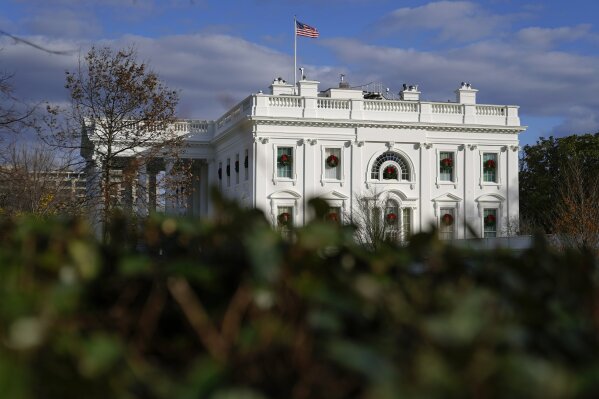 Clouds roll over the White House in Washington, Saturday, Dec. 5, 2020. (AP Photo/Patrick Semansky)