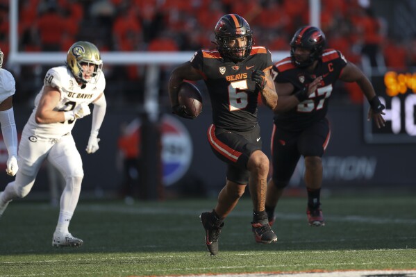Oregon State running back Damien Martinez rushes against UC Davis during the first half of an NCAA college football game Saturday, Sept. 9, 2023, in Corvallis, Ore. (AP Photo/Amanda Loman)