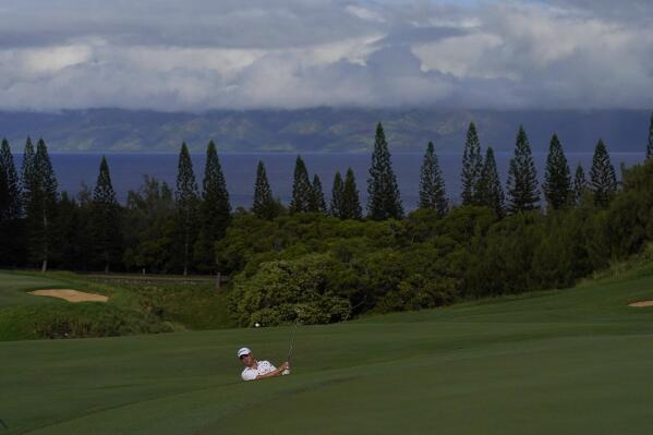 Justin Thomas plays a shot from a bunker on the ninth hole during the Tournament of Champions pro-am golf event, Wednesday, Jan. 4, 2023, at Kapalua Plantation Course in Kapalua, Hawaii. (AP Photo/Matt York)